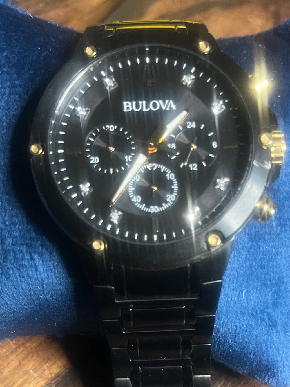 Bulova Classic Diamond Black Watch with Gold Accents and Crystal Markers
